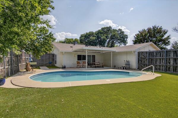 6331 North Jim Miller Road Dallas, TX 75228 - Photo 26 of 28 View of pool featuring a patio area and a fenced backyard