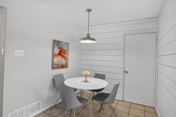 6331 North Jim Miller Road Dallas, TX 75228 - Photo 10 of 28 Dining room with tile patterned floors