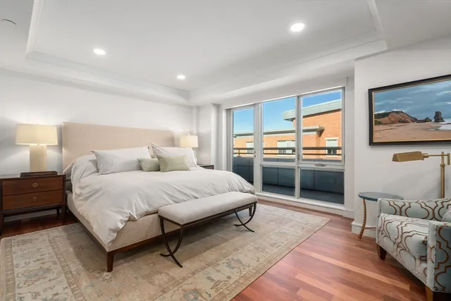 a open kitchen with stainless steel appliances granite countertop a stove and a refrigerator