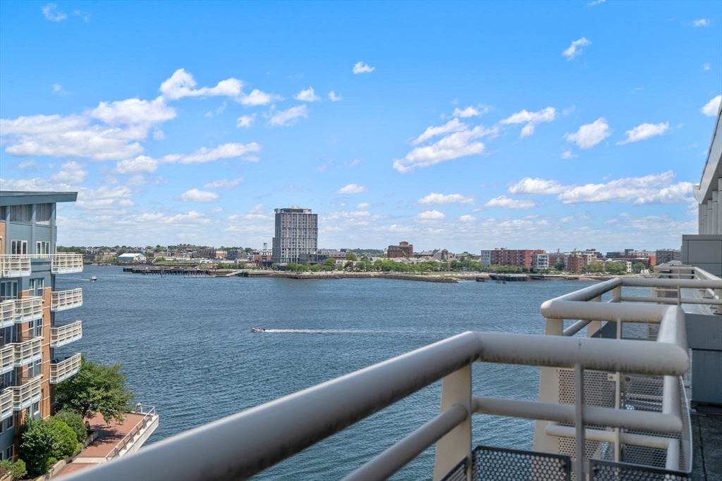 4 Battery Wharf, Unit 4604 Boston, MA 02109 - Photo 9 of 39 a view of swimming pool with outdoor seating and city view