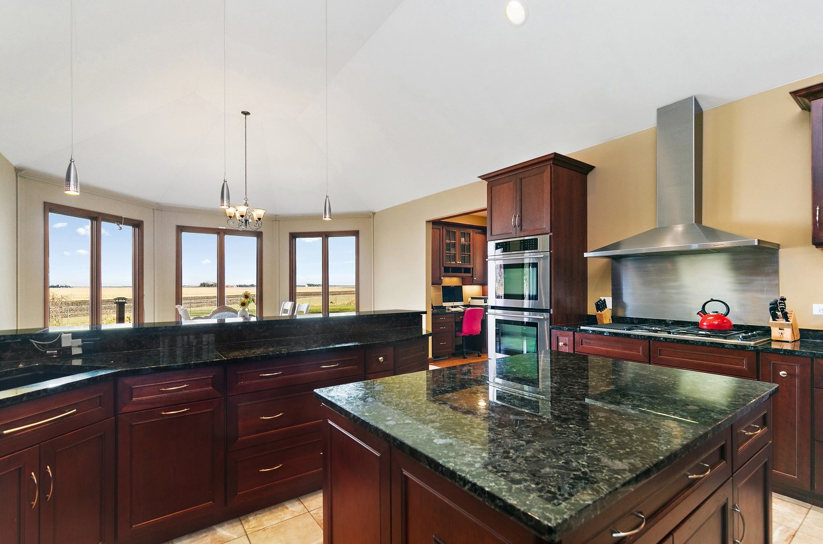 550 Maplewood Road Somonauk, IL 60552 - Photo 16 of 91 a kitchen with stainless steel appliances granite countertop a sink a stove and a wooden cabinets