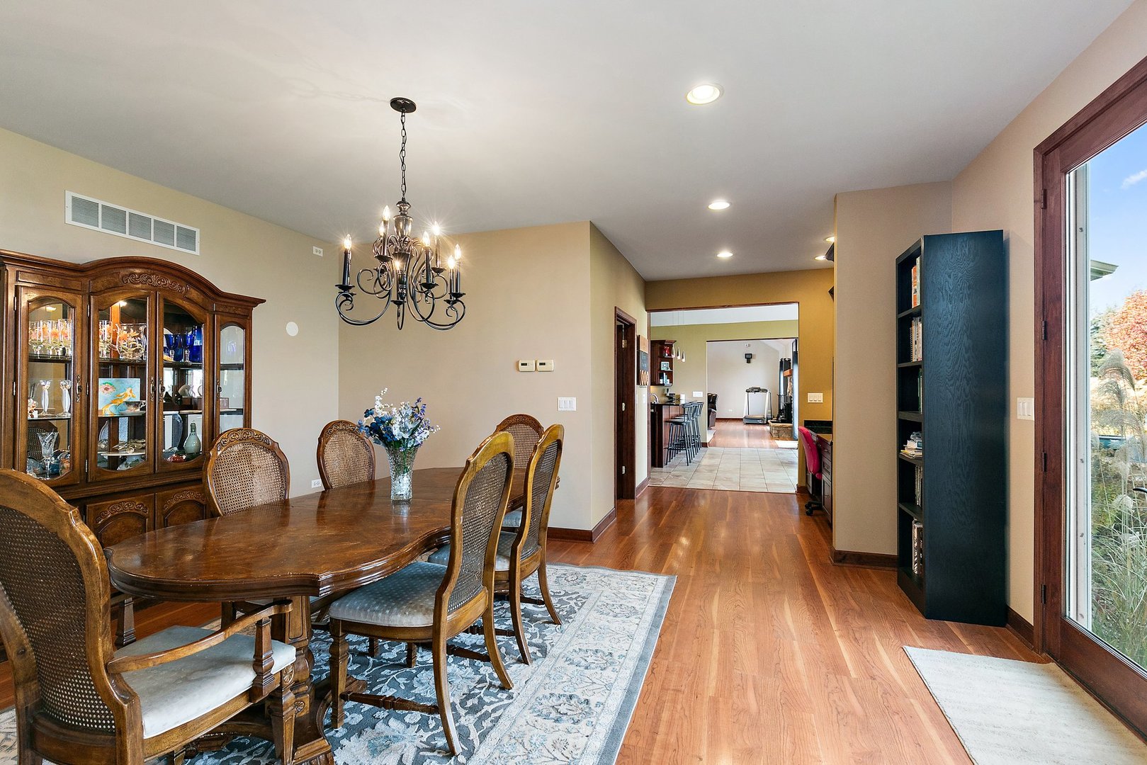 550 Maplewood Road Somonauk, IL 60552 - Photo 18 of 91 a view of a dining room with furniture and wooden floor