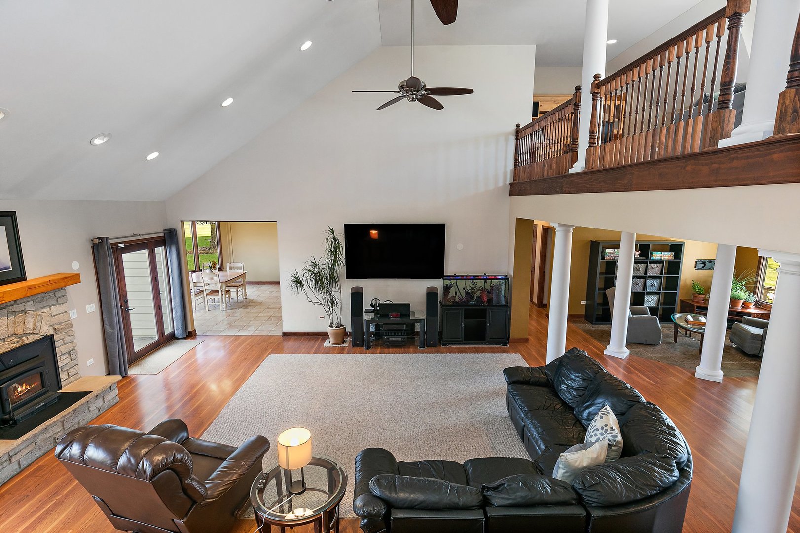 550 Maplewood Road Somonauk, IL 60552 - Photo 24 of 91 a living room with furniture fireplace and flat screen tv