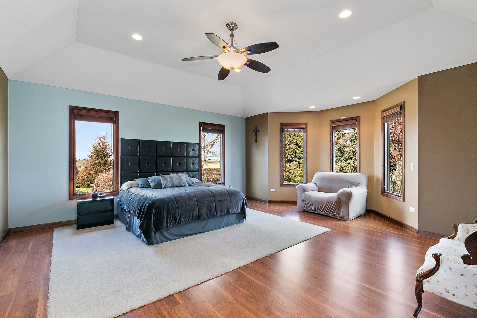550 Maplewood Road Somonauk, IL 60552 - Photo 25 of 91 a spacious bedroom with a large bed couch and windows