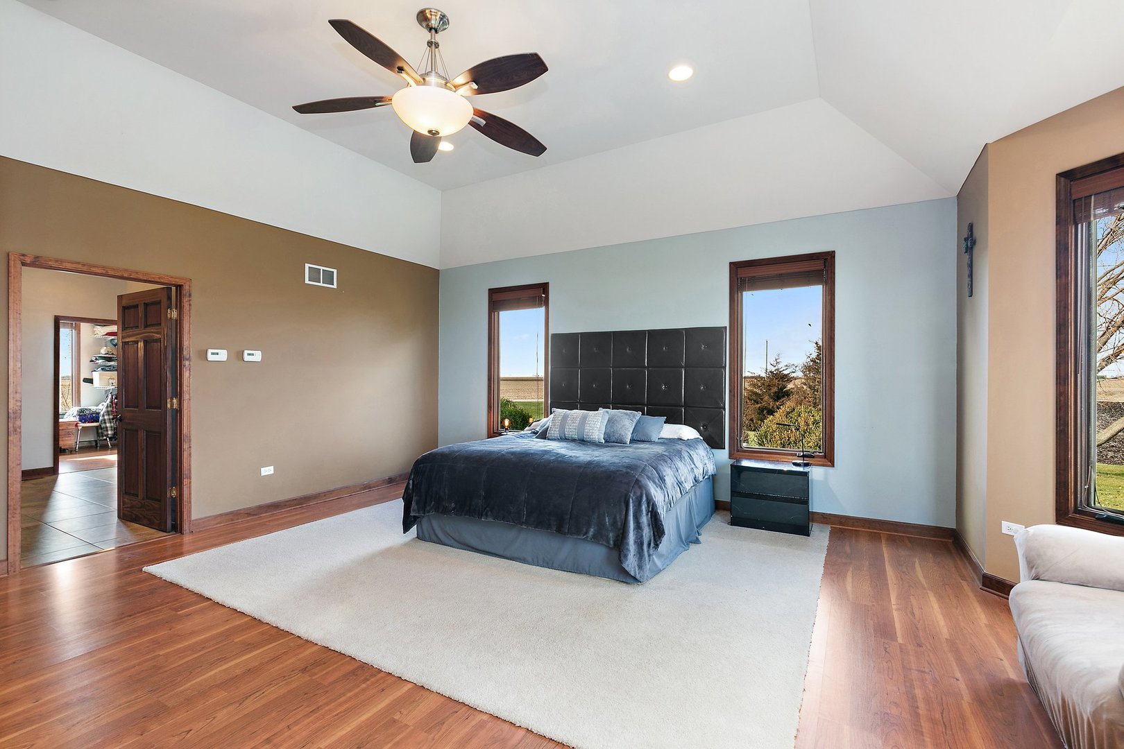 550 Maplewood Road Somonauk, IL 60552 - Photo 26 of 91 a bedroom with a bed and a ceiling fan