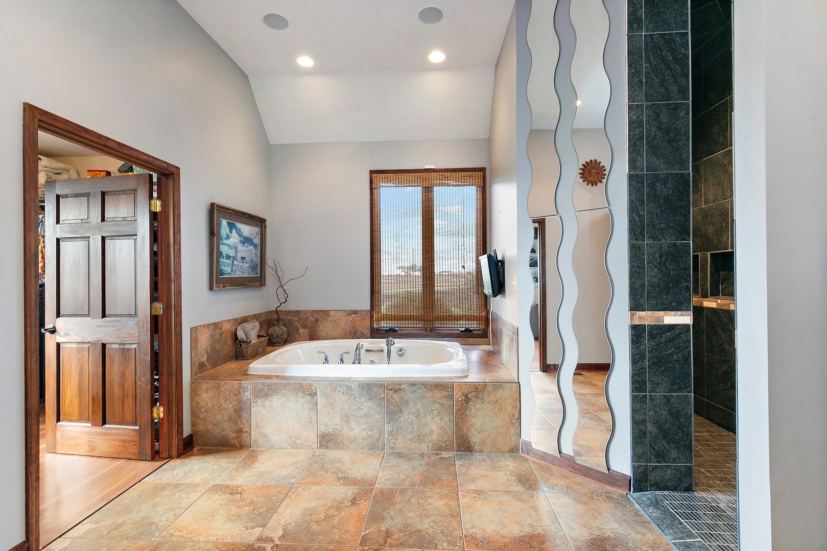 550 Maplewood Road Somonauk, IL 60552 - Photo 27 of 91 a white bath tub sitting in a bathroom next to a window