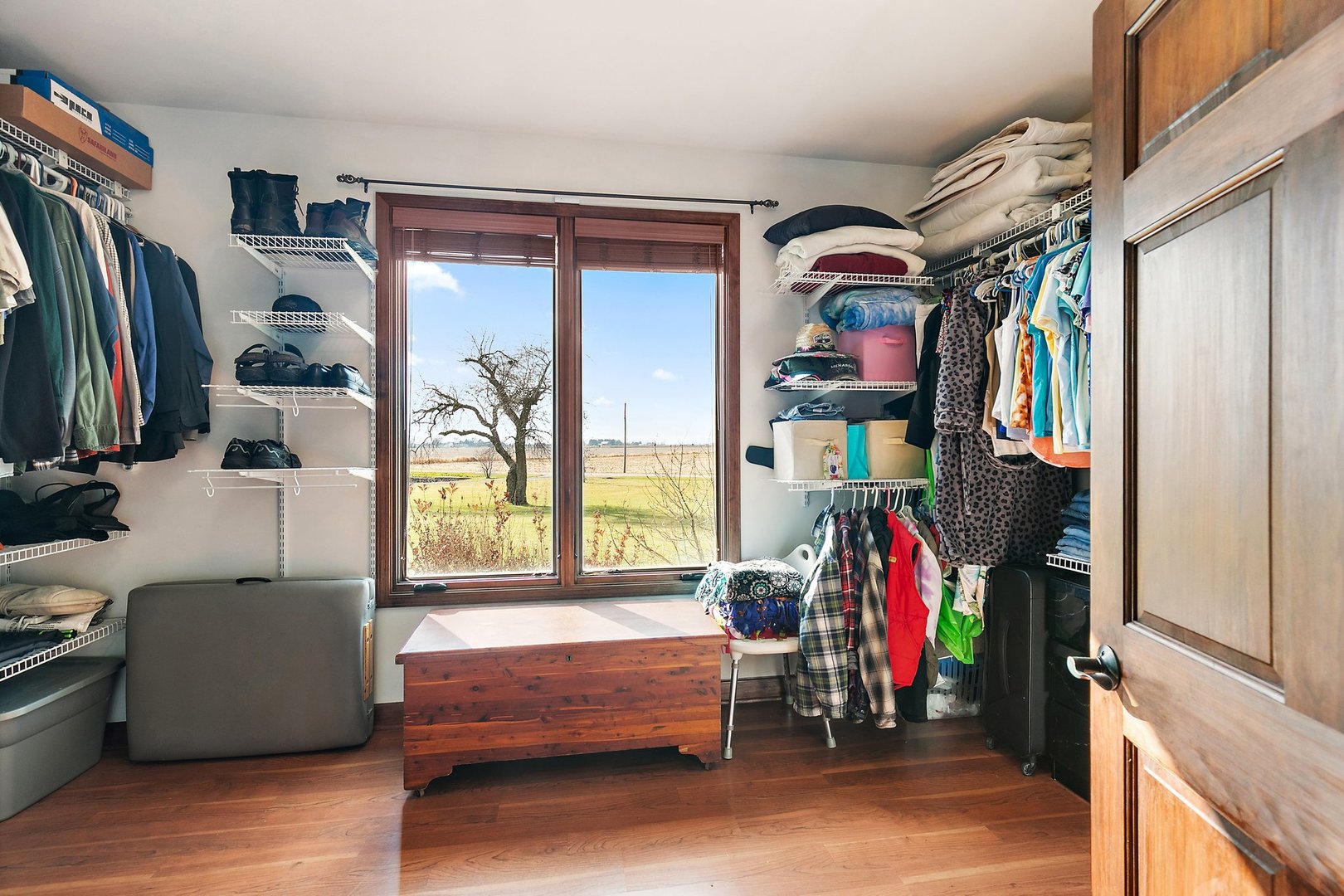 550 Maplewood Road Somonauk, IL 60552 - Photo 30 of 91 a view of walk in closet with clothes and shoes