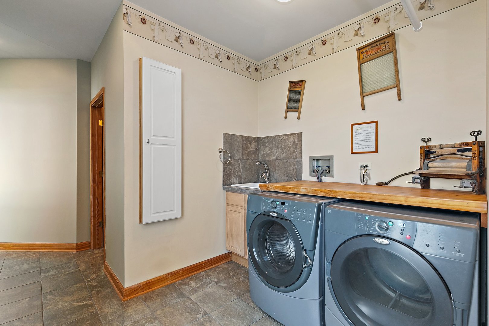 550 Maplewood Road Somonauk, IL 60552 - Photo 36 of 91 a view of a storage & utility room with washer and dryer