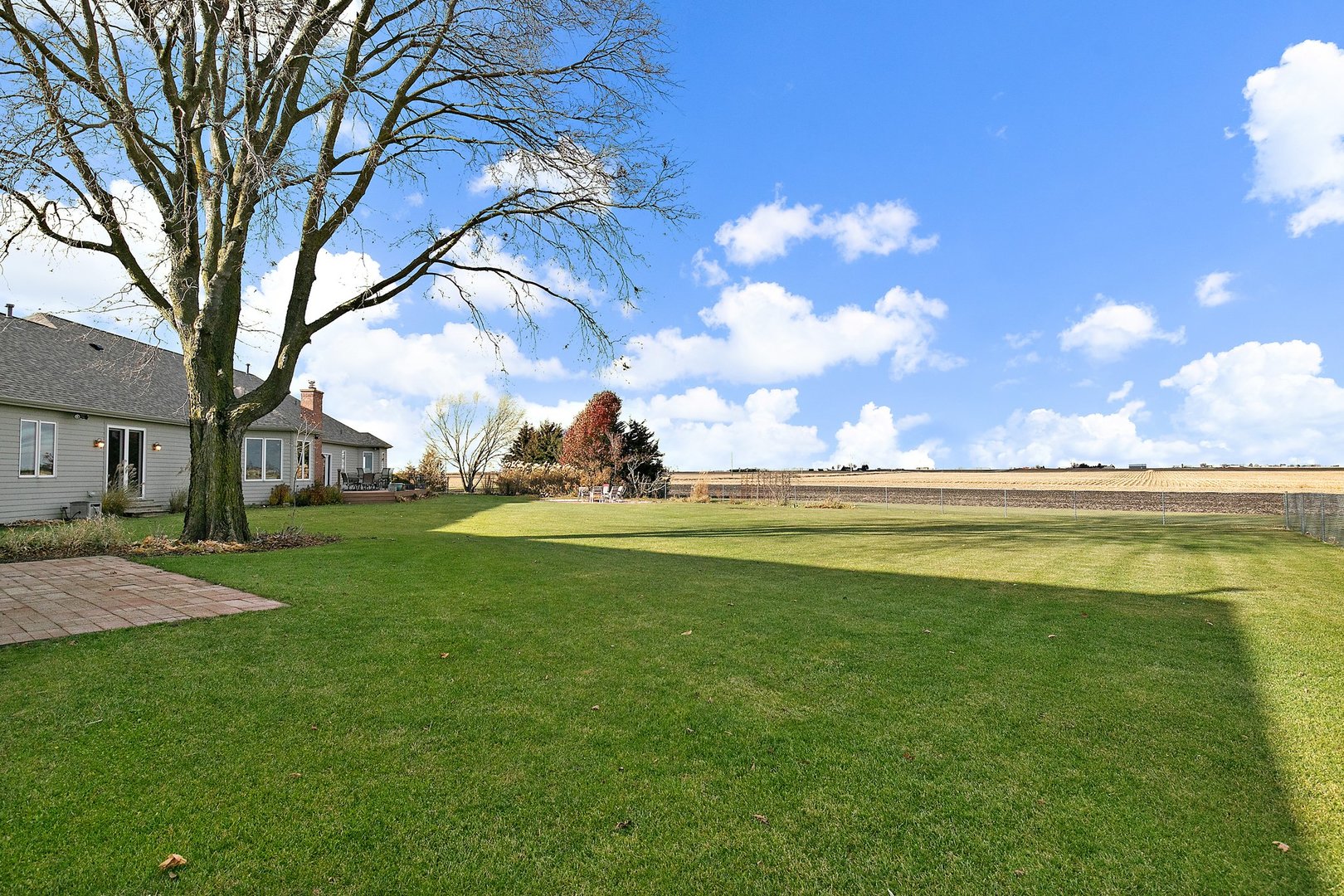 550 Maplewood Road Somonauk, IL 60552 - Photo 60 of 91 a view of a golf course with a lake