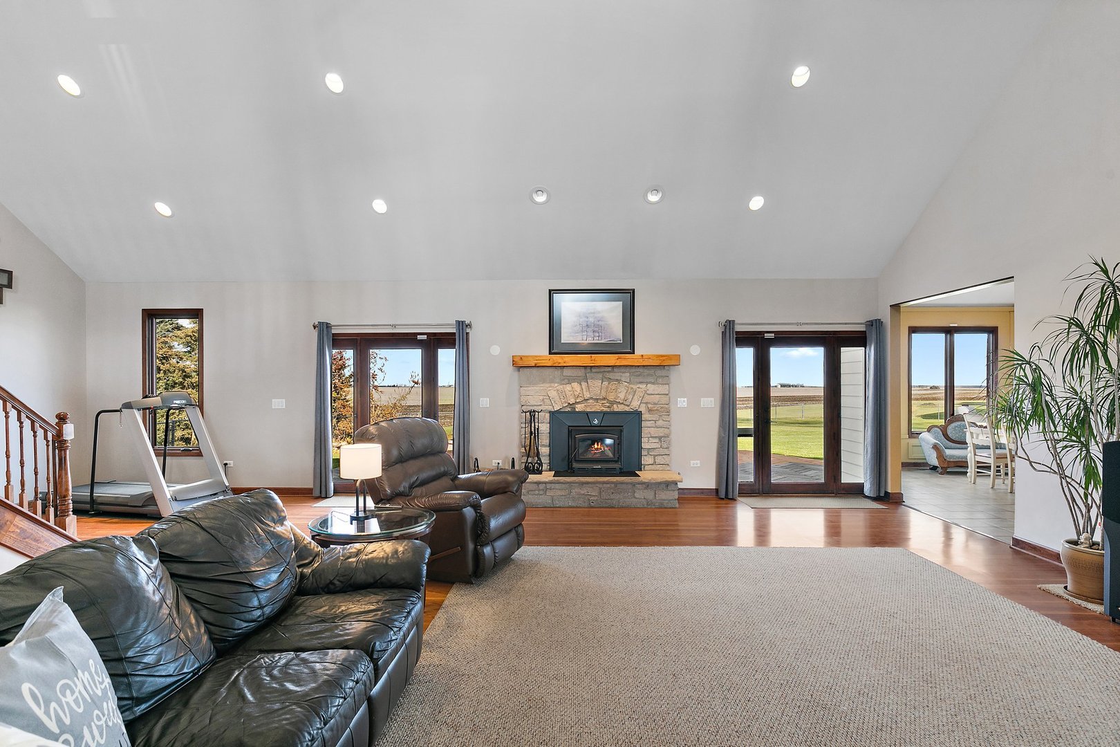 550 Maplewood Road Somonauk, IL 60552 - Photo 7 of 91 a living room with furniture and a fireplace