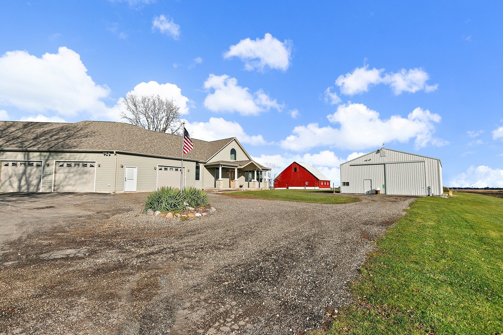 550 Maplewood Road Somonauk, IL 60552 - Photo 71 of 91 a view of a house with a yard and garage