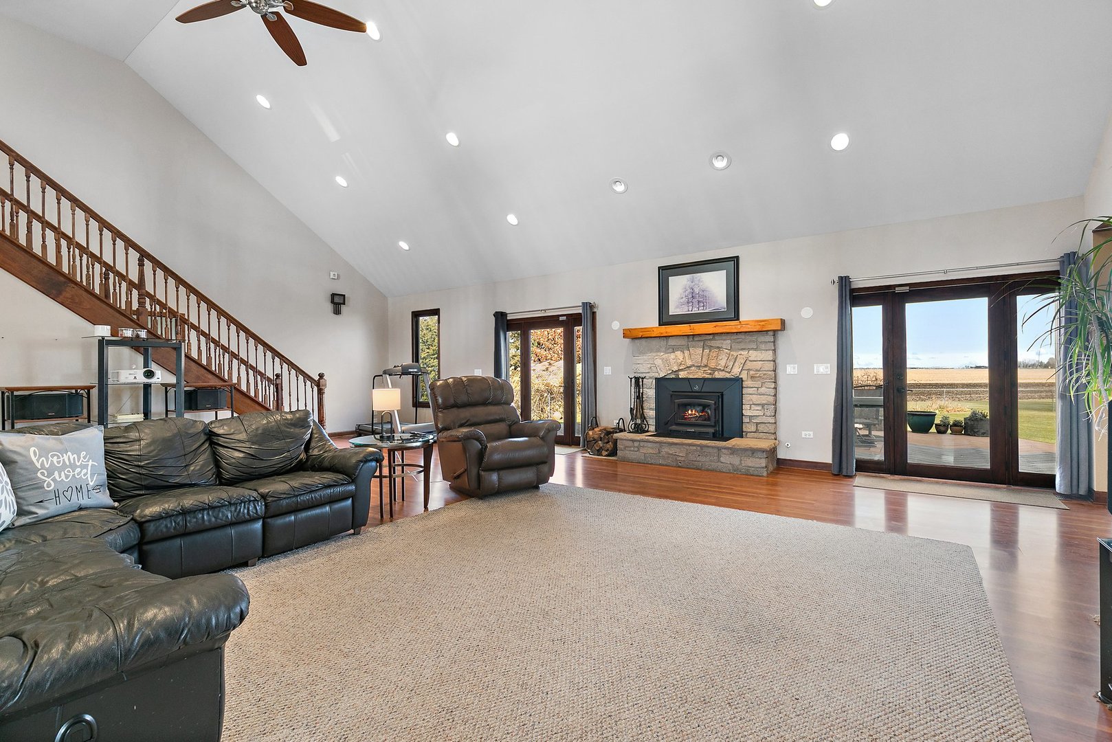 550 Maplewood Road Somonauk, IL 60552 - Photo 9 of 91 a living room with furniture and a fireplace