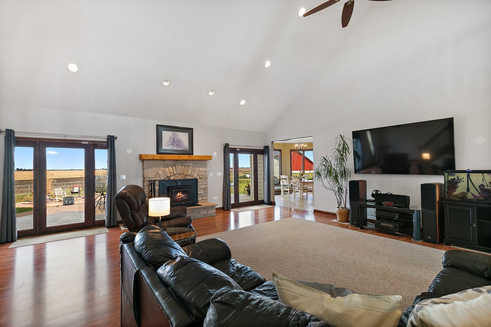 550 Maplewood Road Somonauk, IL 60552 - Photo 10 of 91 a living room with furniture and a flat screen tv