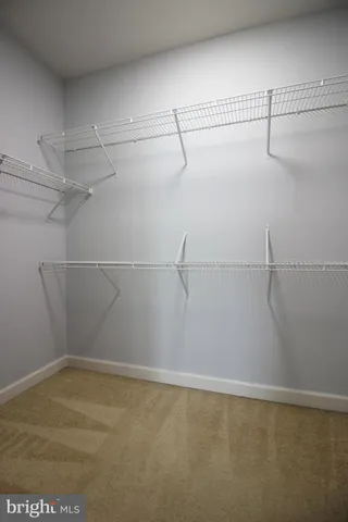 a view of a house with wooden deck