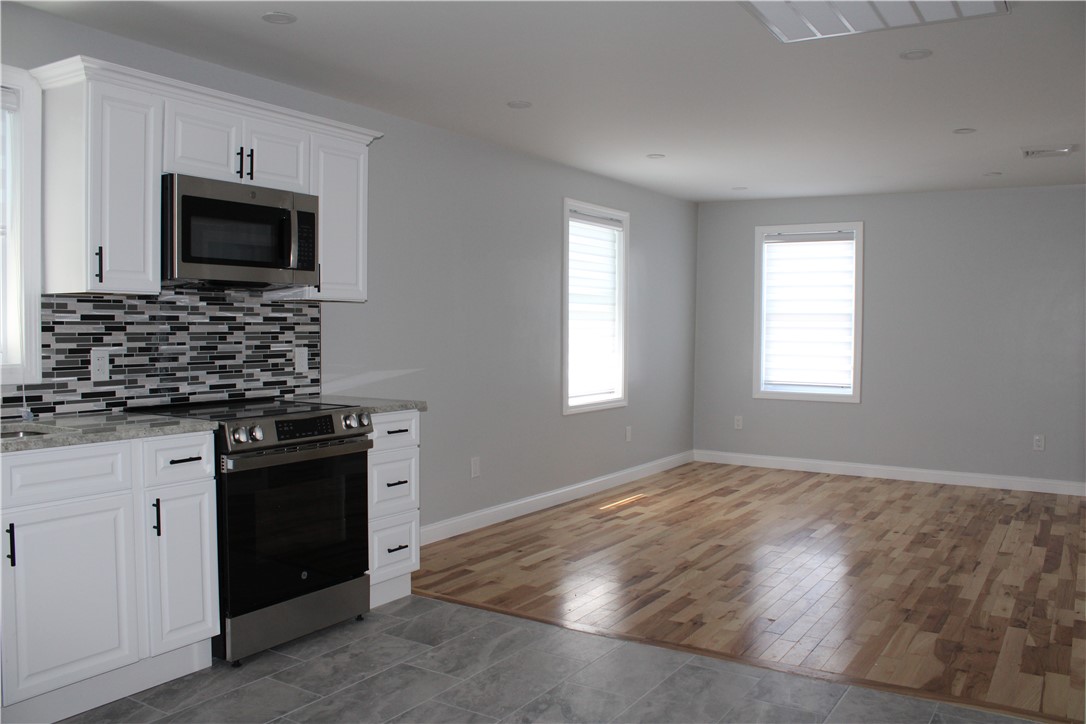 213 Francis Avenue Pawtucket, RI 02860 - Photo 11 of 16 Unit 2 Kitchen to Livingroom view