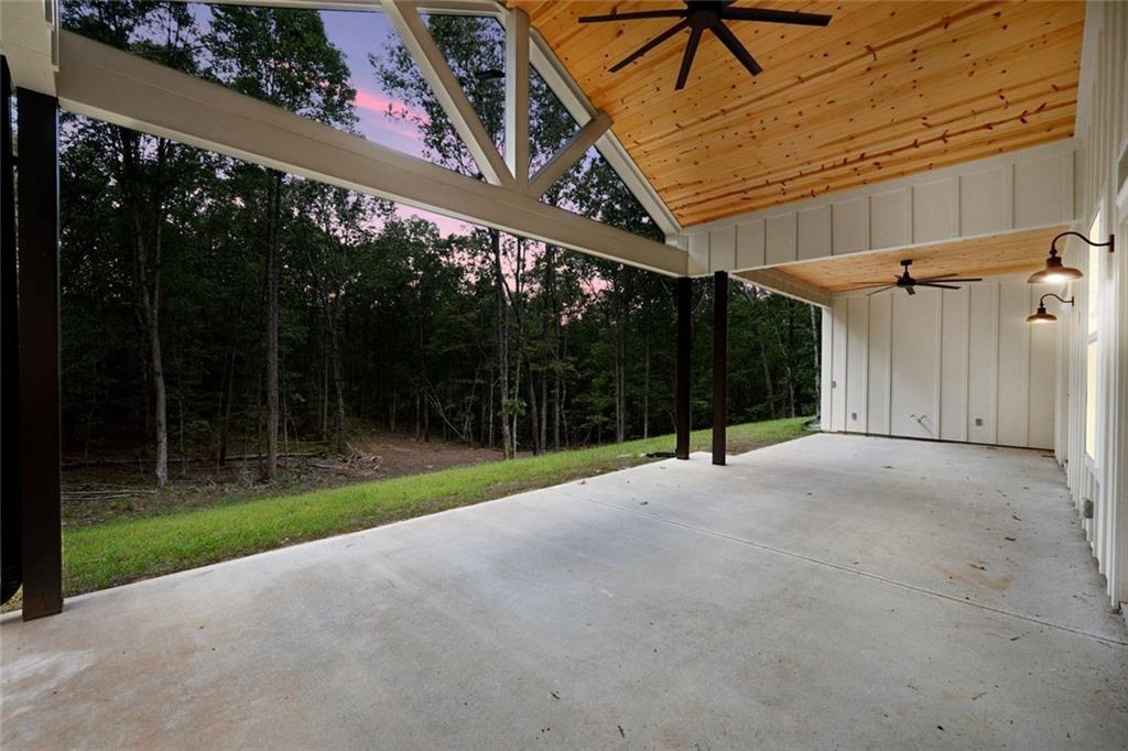 5567 Tyree Road Winston, GA 30187 - Photo 24 of 28 a view of a house with backyard and porch