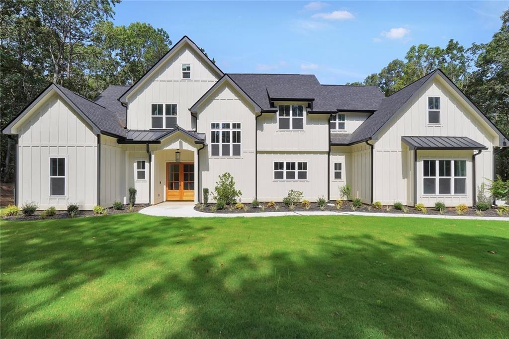 5567 Tyree Road Winston, GA 30187 - Photo 27 of 28 a front view of a house with a yard