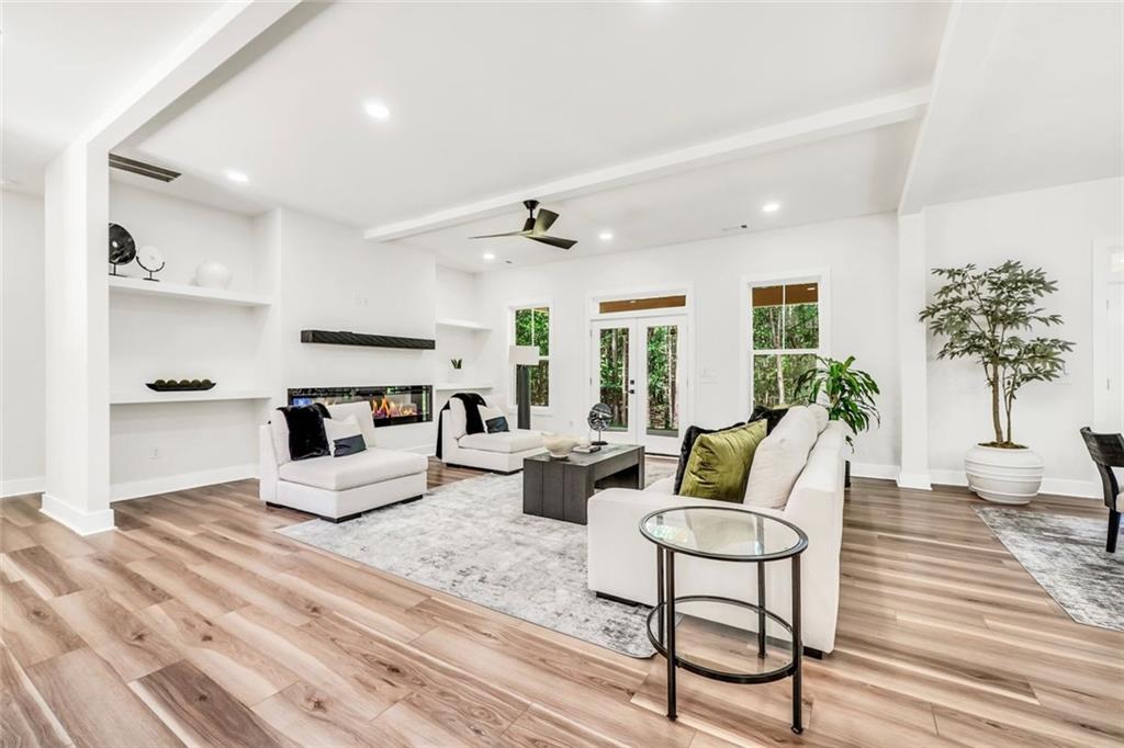 5567 Tyree Road Winston, GA 30187 - Photo 4 of 28 a living room with furniture and a large window