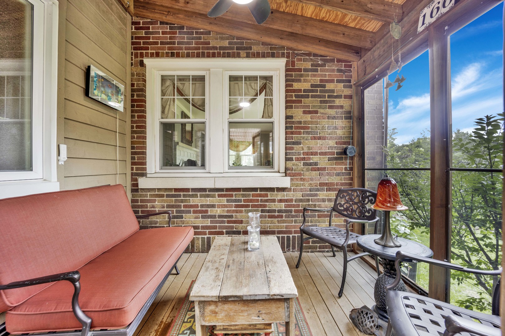 166 South Delaplaine Road Riverside, IL 60546 - Photo 33 of 41 a view of a deck with table and chairs with wooden floor and fence