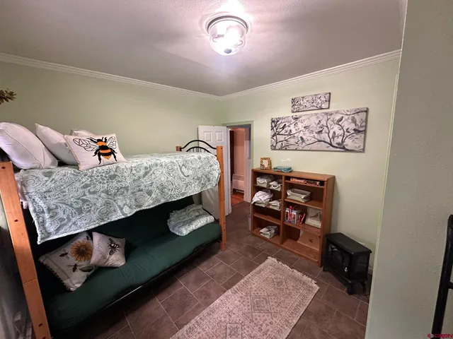 a view of a livingroom with furniture and window