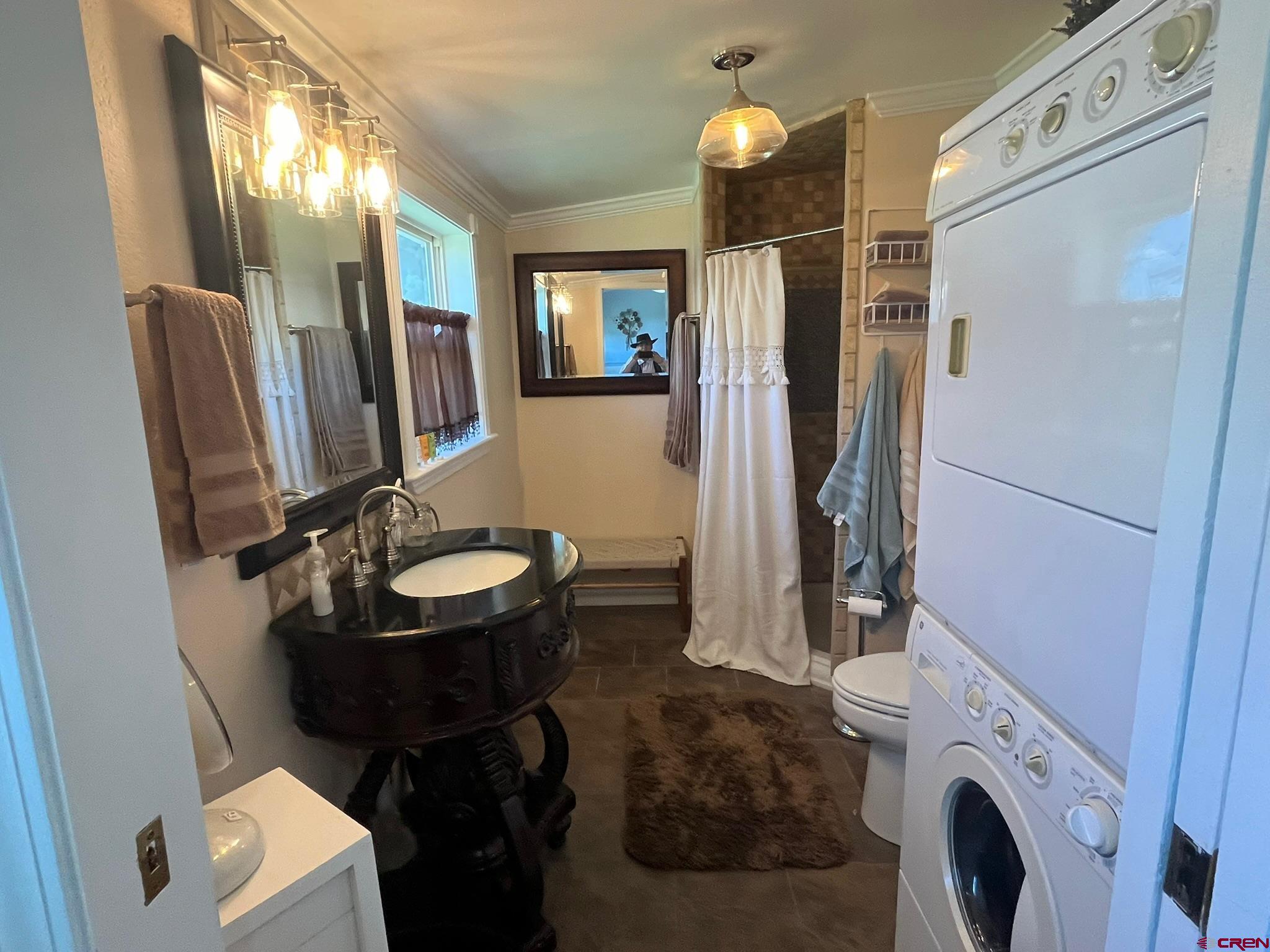 1250 Snowden Street Silverton, CO 81433 - Photo 21 of 34 a bathroom with a sink a toilet and shower