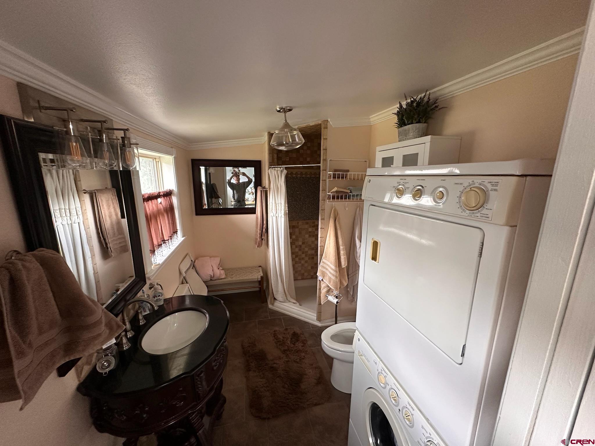 1250 Snowden Street Silverton, CO 81433 - Photo 22 of 34 a room with refrigerator a washer and dryer