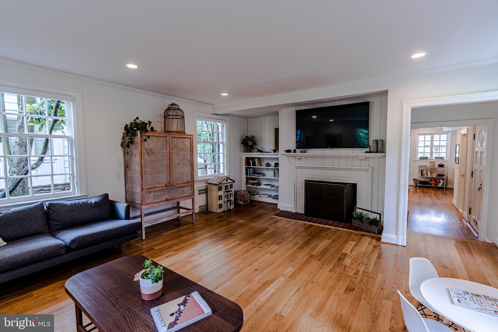 323 Tunbridge Road Baltimore, MD 21212 - Photo 15 of 53 Wood burning fireplace and built-in bookcase