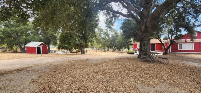 a view of street with trees in the background