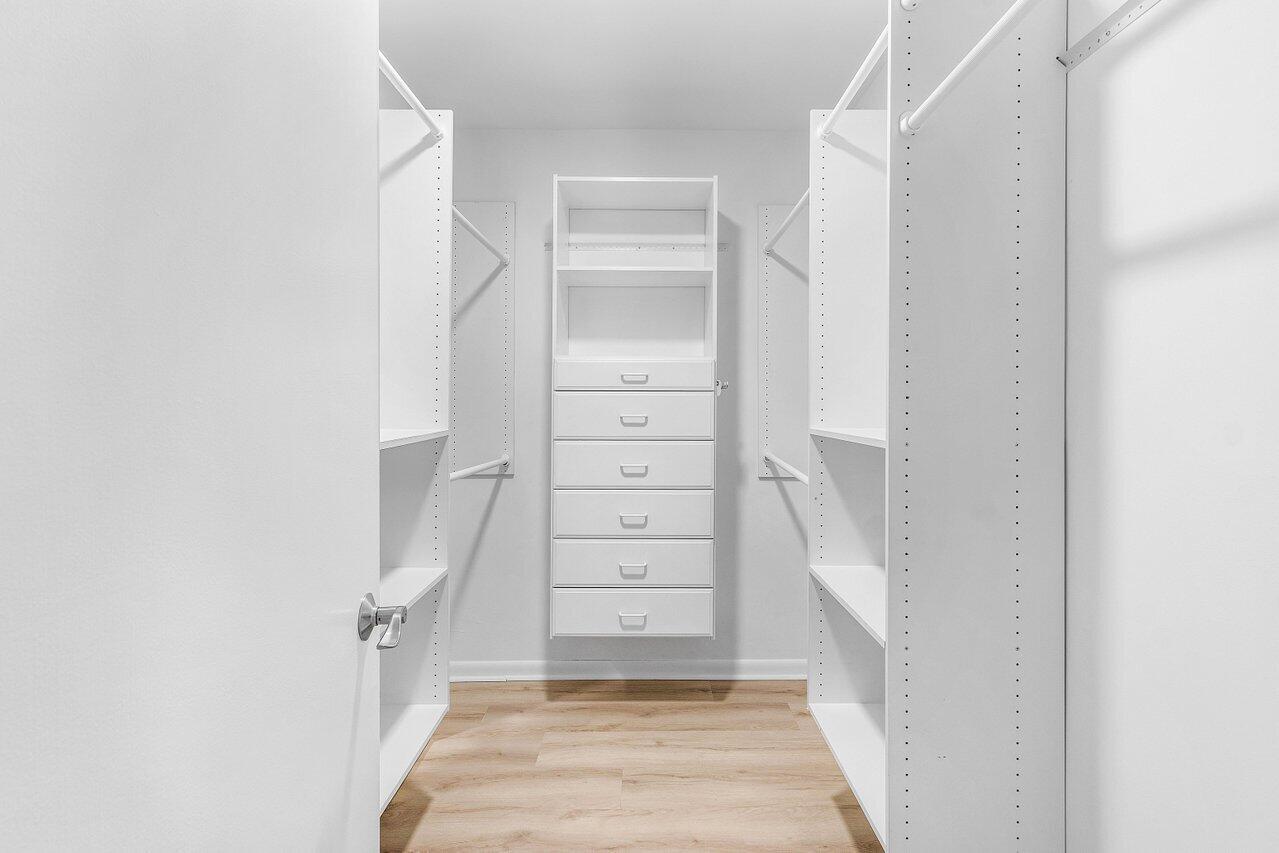 5109 North Ocean Boulevard, Unit H Ocean Ridge, FL 33435 - Photo 24 of 45 a view of walk in closet with empty racks