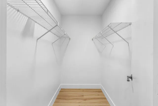 a utility room with sink dryer and washer