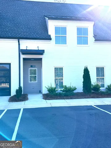 a house view with garden space