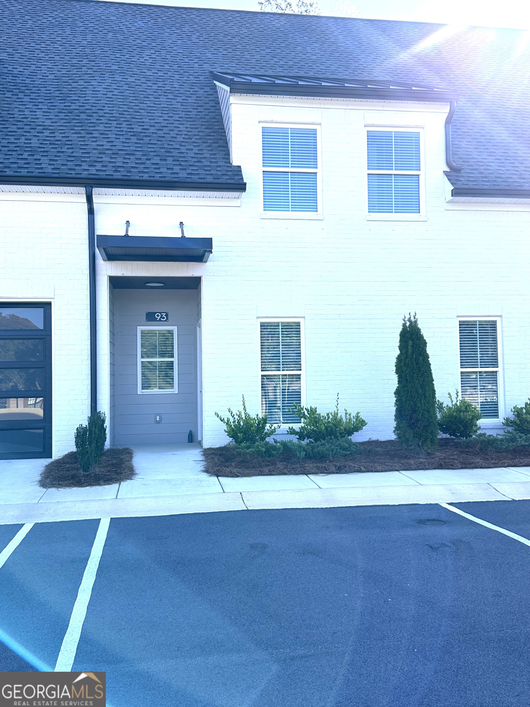 a house view with garden space