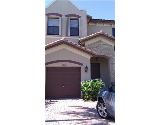 11280 Southwest 238th Street, Unit 11280 Homestead, FL 33032 - Photo 2 of 6 Exterior Front