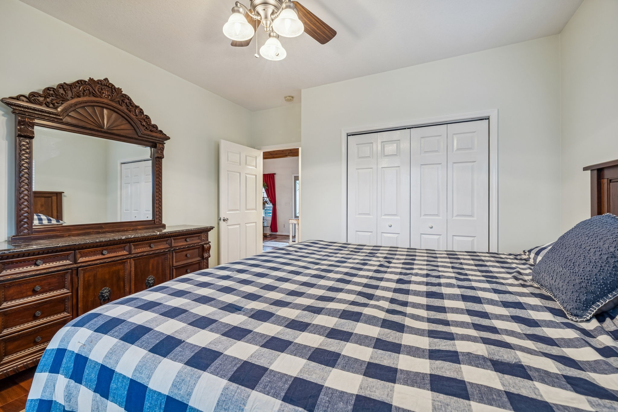 9200 Dobbs Cemetery Road Baxter, TN 38544 - Photo 38 of 85 a bedroom with a bed and a large mirror on dresser