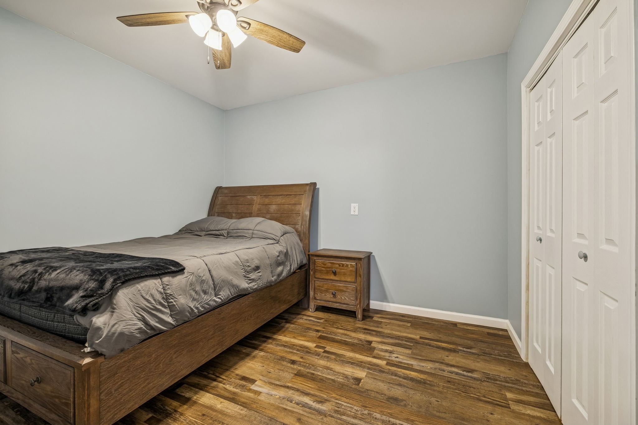 9200 Dobbs Cemetery Road Baxter, TN 38544 - Photo 46 of 85 a bedroom with a bed and wooden floor