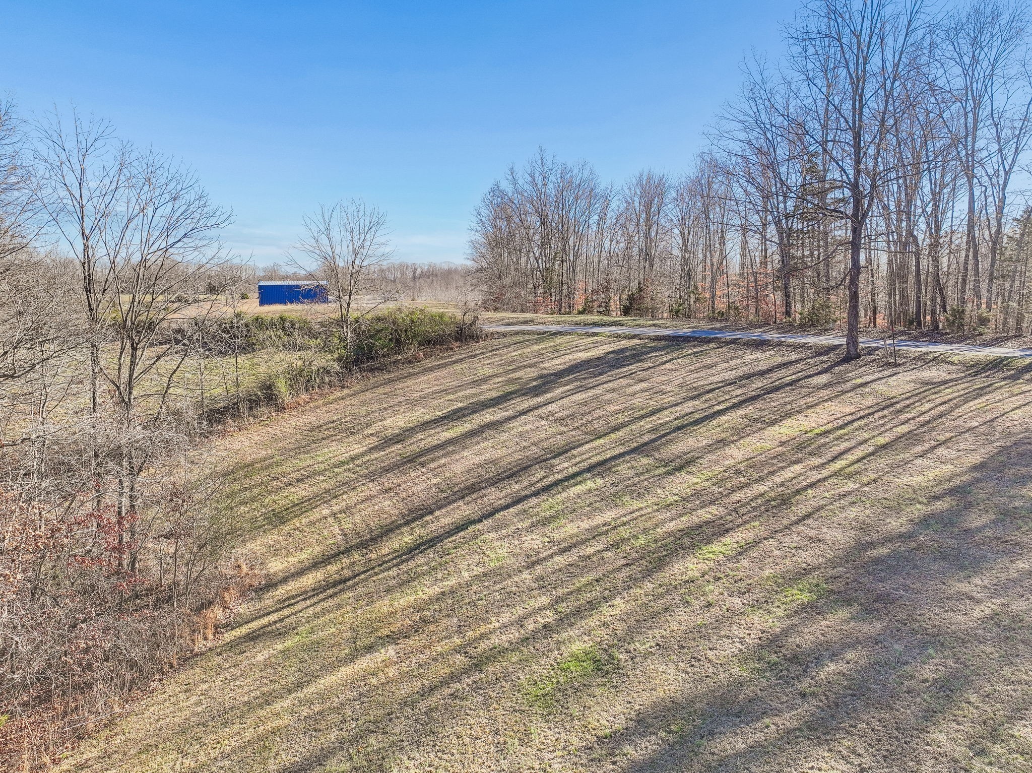 9200 Dobbs Cemetery Road Baxter, TN 38544 - Photo 67 of 85 a view of road with a building in the background