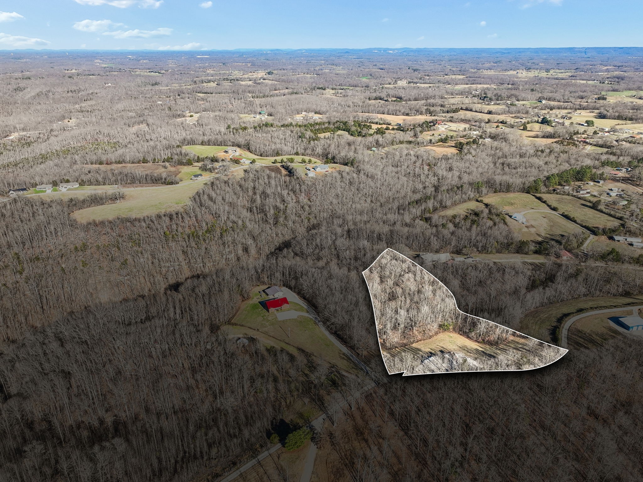 9200 Dobbs Cemetery Road Baxter, TN 38544 - Photo 71 of 85 an aerial view of a house with a yard