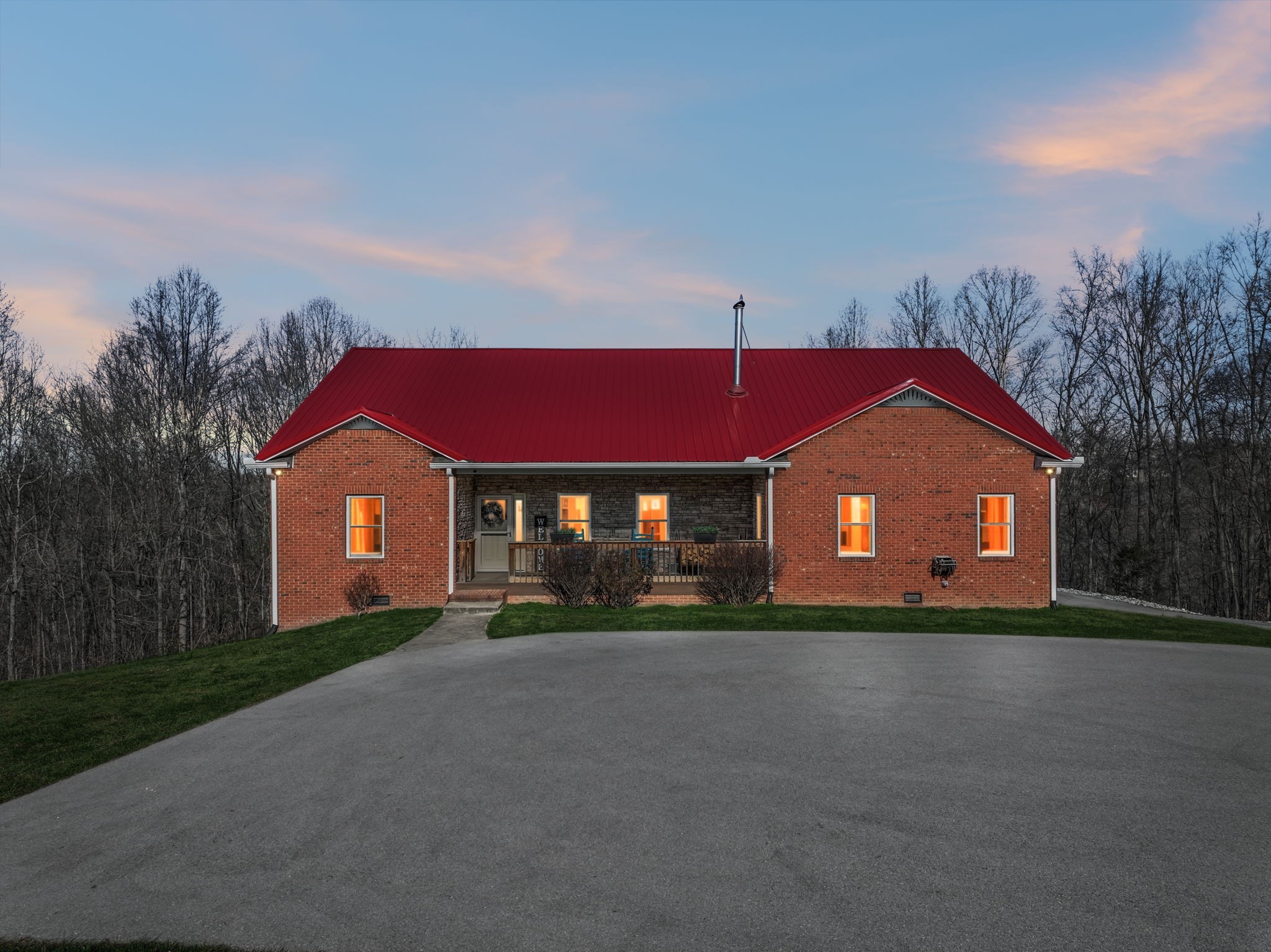 9200 Dobbs Cemetery Road Baxter, TN 38544 - Photo 80 of 85 a front view of a house with a yard