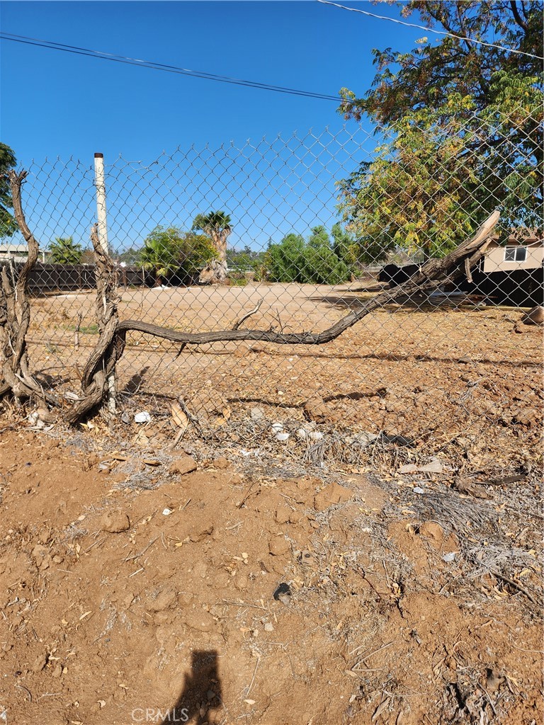 0 Arlington Riverside, CA 92505 - Photo 3 of 4 a view of a dry yard with wooden fence