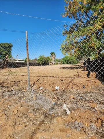 a view of a backyard of a house