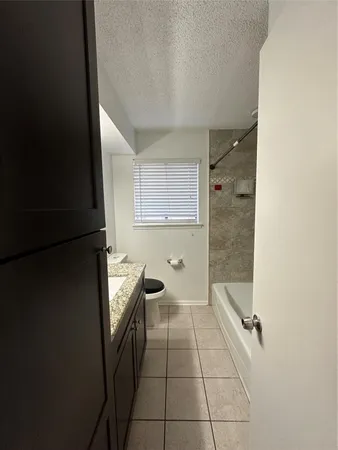 a hallway with a wooden cabinets