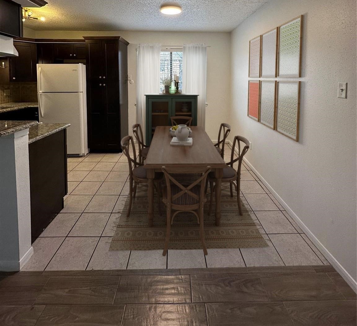 1410 Blalock Road, Unit 9 Houston, TX 77055 - Photo 3 of 18 a view of a dining room with furniture