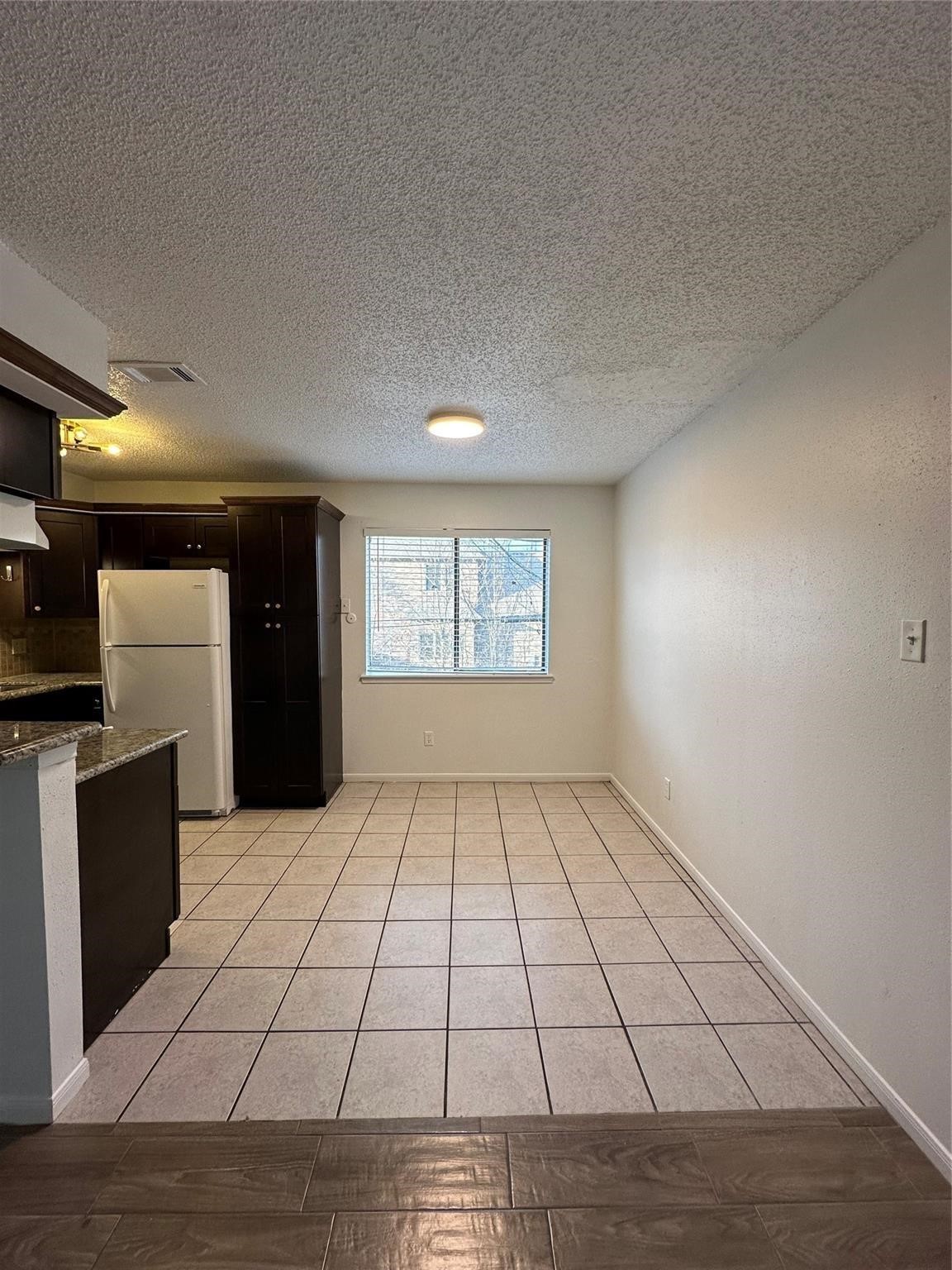 1410 Blalock Road, Unit 9 Houston, TX 77055 - Photo 5 of 18 a view of an empty room and window