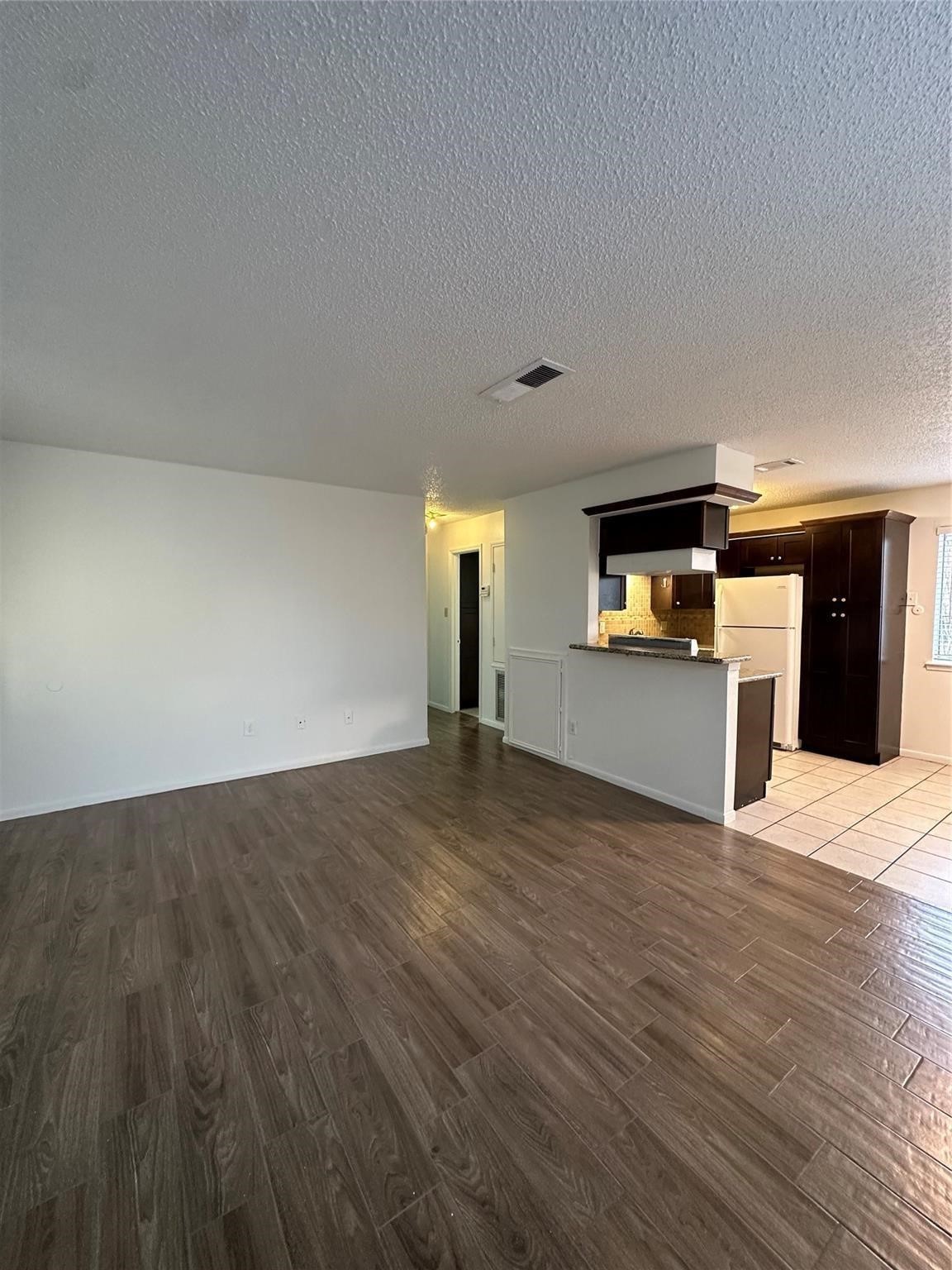 1410 Blalock Road, Unit 9 Houston, TX 77055 - Photo 9 of 18 a view of a kitchen with a sink and a stove top oven