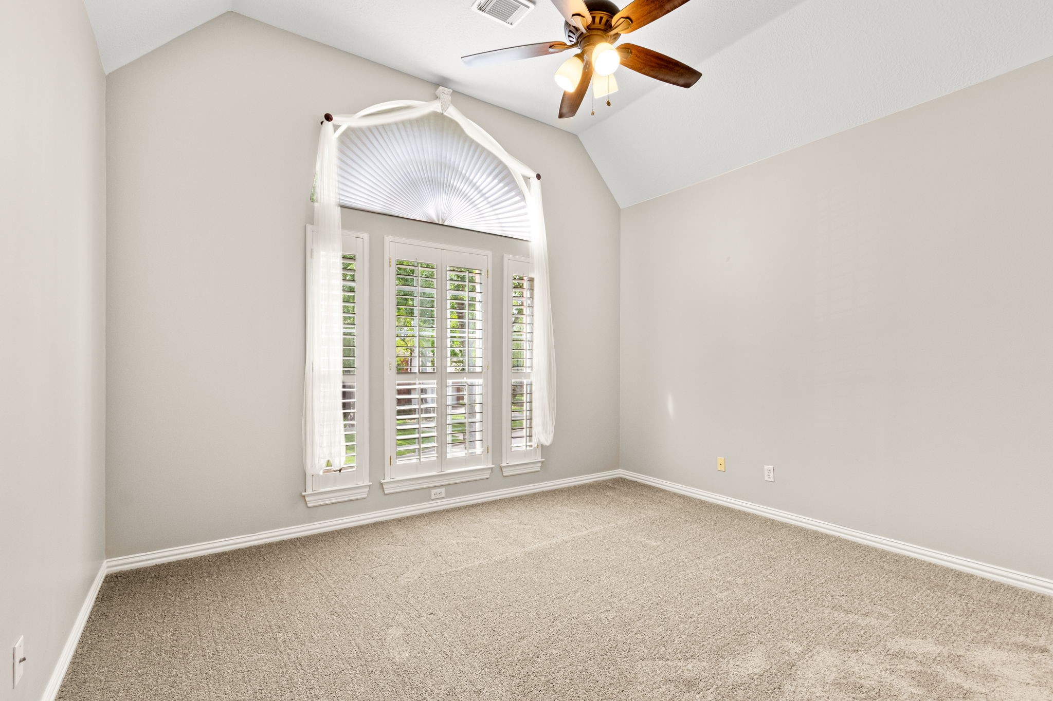 5803 Desert Oak Way Spring, TX 77379 - Photo 34 of 50 Plantation shutters, new carpet and high ceilings in this secondary bedroom.