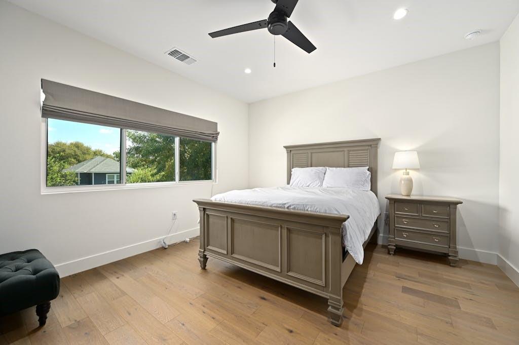 5212 Huisache Street, Unit 2 Austin, TX 78751 - Photo 25 of 30 Bedroom with light wood-style flooring, a ceiling fan, and recessed lighting