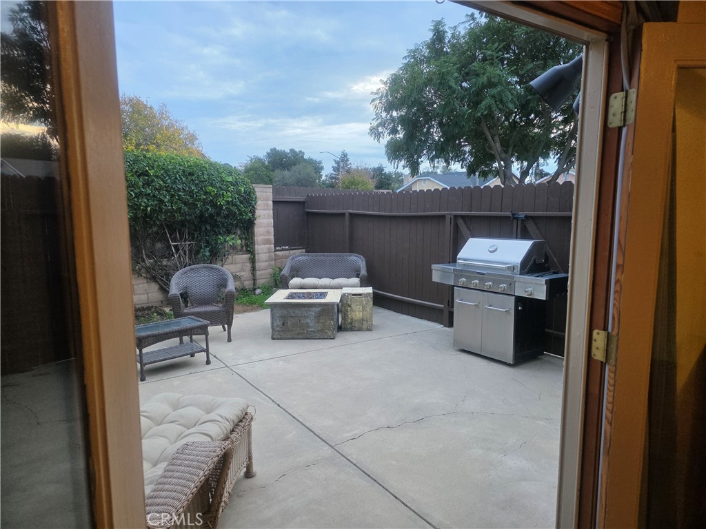1618 Charlie Lane Santa Maria, CA 93454 - Photo 17 of 57 a view of a patio with a table and chairs