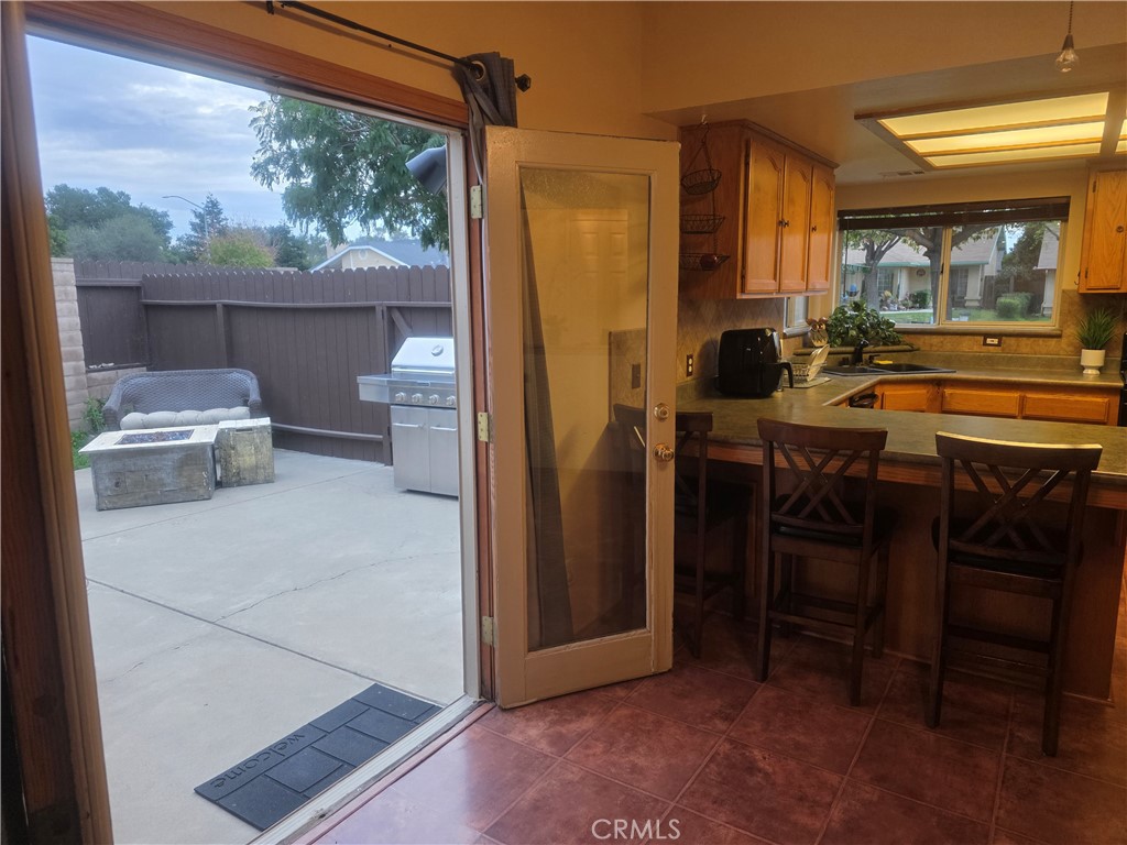 1618 Charlie Lane Santa Maria, CA 93454 - Photo 20 of 57 a view of a dining room with furniture window and outside view