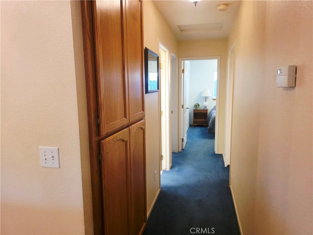 1618 Charlie Lane Santa Maria, CA 93454 - Photo 27 of 57 a view of a hallway with wooden floor and closet