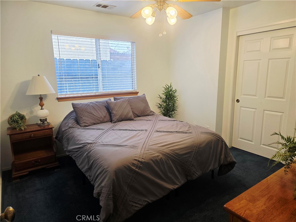 1618 Charlie Lane Santa Maria, CA 93454 - Photo 31 of 57 a bedroom with a bed and a window